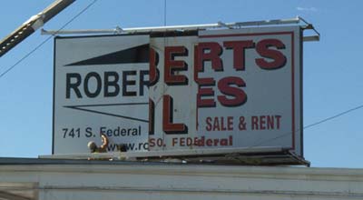 Three generations of Roberts Sales signage