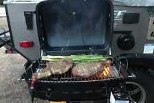 Flagstaff exterior grill in use by Steve and Fontaine O'Connell