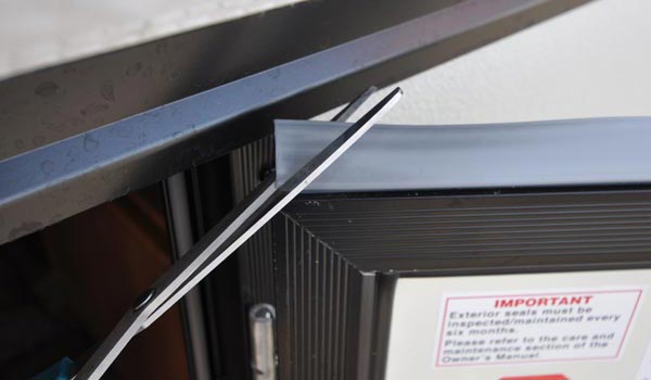 Flagstaff/Rockwood travel door weatherstrip/gray-strip angle fix