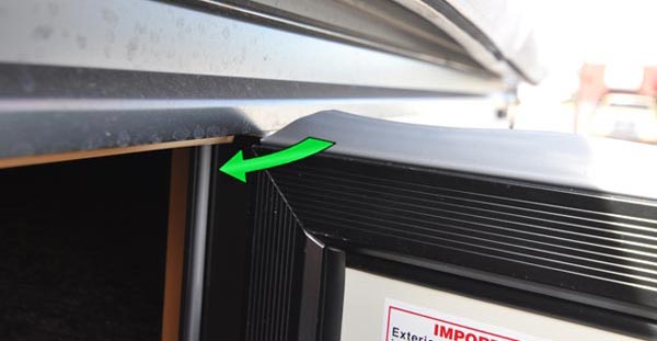 Flagstaff/Rockwood travel door gray strip now closes easily